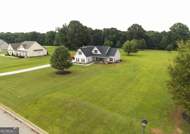 Photo 3 of Single family home for sale at 301 Savannah Dr, Mansfield, GA 30055 | MLS# 10827379 | Listing updated on 2026-08-31