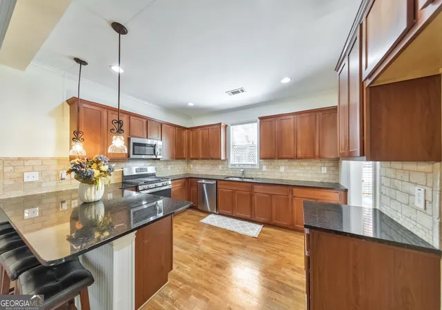 Photo 3 of Single family home for sale at 44 Magnolia Pkwy, Hampton, GA 30228 | MLS# 10832577 | Listing updated on 2026-09-10