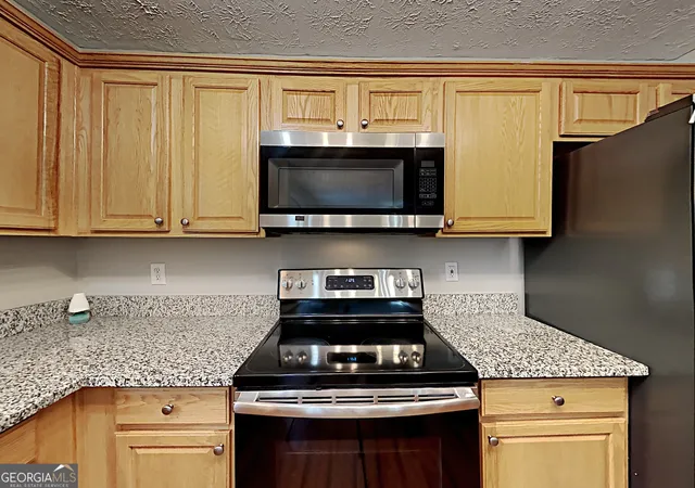 Photo 4 of Single family home for sale at 825 Roxfield Ct, Buford, GA 30518 | MLS# 10793909 | Listing updated on 2026-10-02