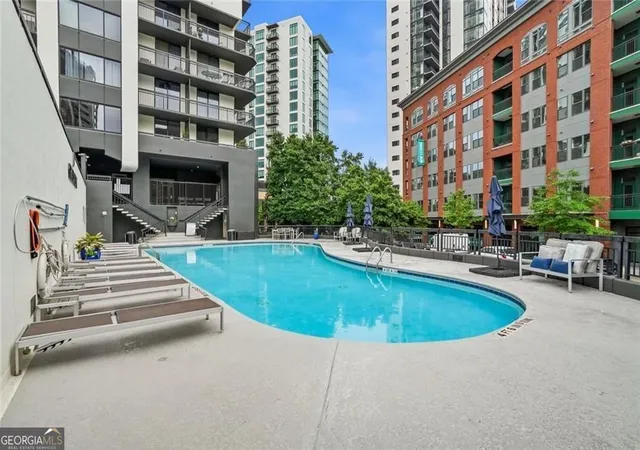 Listing Photo 2 - Condo for sale in building located at 3481 Lakeside Dr, Atlanta, GA 30326 - Unit #PH TS5