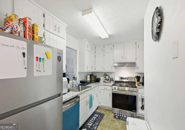 5th image of 5842 N Castlegate Dr, Atlanta, GA 30349 | MLS# 10818289
