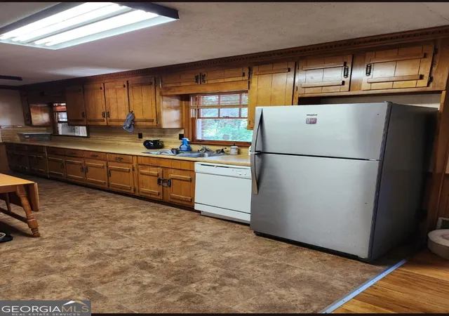 Photo 3 of Single family home for sale at 6369 Harbin Woods Dr, Morrow, GA 30260 | MLS# 10806329 | Listing updated on 2026-09-10