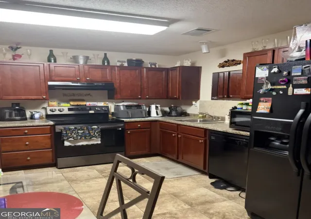 Photo 3 of Townhouse for sale at 1727 Old Dogwood, Jonesboro, GA 30238 | MLS# 10789109 | Listing updated on 2026-09-11