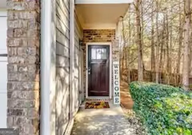 Photo 2 of Townhouse for sale at 1547 Paxton Dr Sw, Lilburn, GA 30047 | MLS# 10717110 | Listing updated on 2026-09-18