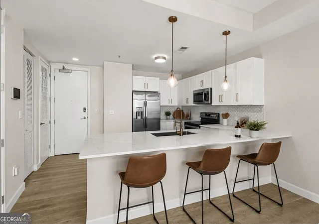 Photo 3 of Condo for sale at 711 Cosmopolitan Dr Ne #622, Atlanta, GA 30324 | MLS# 10834212 | Listing updated on 2026-09-29