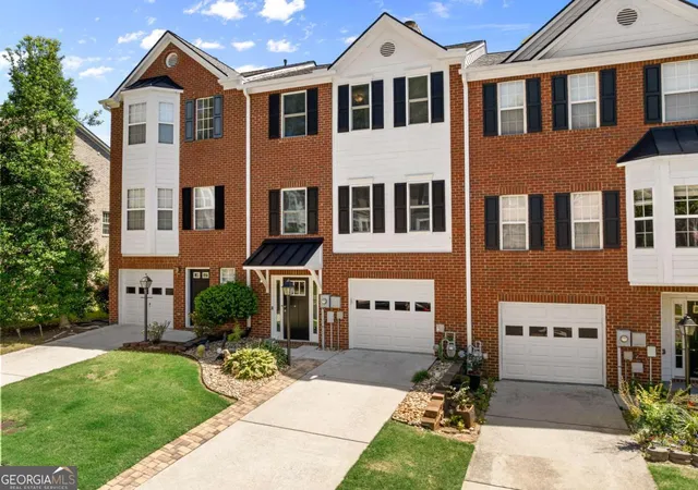Photo 1 of Townhouse for sale at 2105 Millgate Ln, Buford, GA 30519 | MLS# 10780419 | Listing updated on 2026-07-22