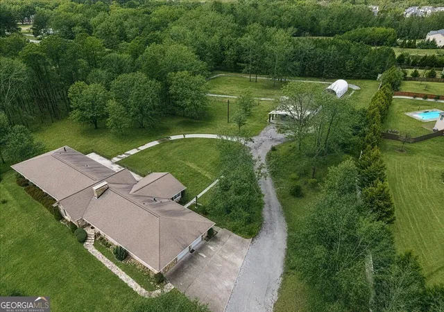 Photo 3 of Mansion for sale at 589 Cooper Rd, Loganville, GA 30052 | MLS# 10829385 | Listing updated on 2026-09-03