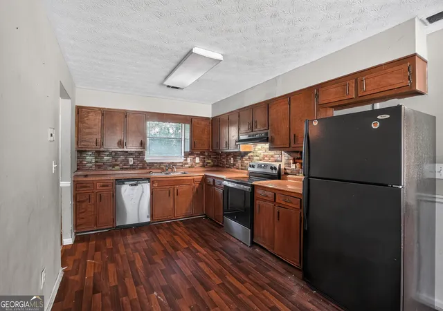 Photo 4 of Single family home for sale at 4981 Thompson Ml Rd, Lithonia, GA 30038 | MLS# 10809129 | Listing updated on 2026-08-13