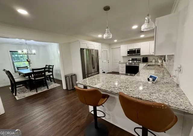 Photo 4 of Single family home for sale at 201 Lockring Dr SW, Lilburn, GA 30047 | MLS# 10802754 | Listing updated on 2026-08-10