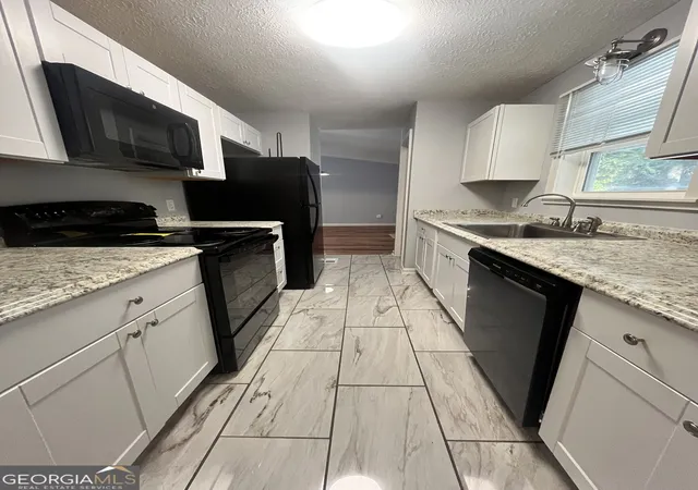 Photo 4 of Single family home for sale at 6015 Sumter Dr, Douglasville, GA 30135 | MLS# 10825791 | Listing updated on 2026-10-03