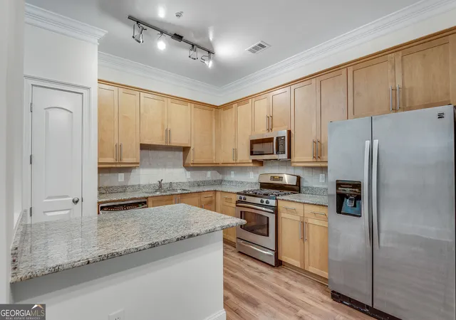 Photo 4 of Condo for sale at 1055 Piedmont Ave Ne #117, Atlanta, GA 30309 | MLS# 10832809 | Listing updated on 2026-09-08