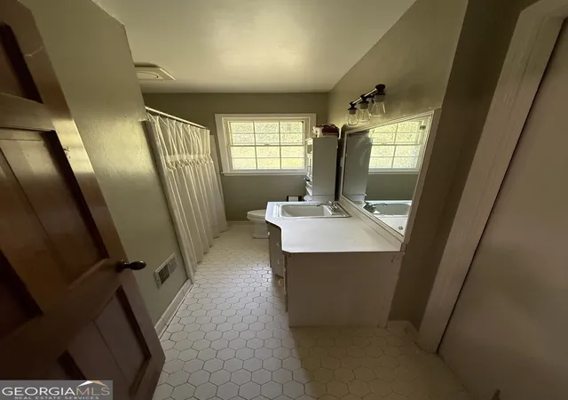 Photo 3 of Single family home for sale at 3906 Cardinal Dr, Tucker, GA 30084 | MLS# 10830664 | Listing updated on 2026-09-04