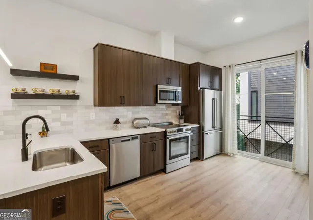 Photo 4 of Townhouse for sale at 2199 Lenox Rd Ne #11, Atlanta, GA 30324 | MLS# 10802717 | Listing updated on 2026-10-22