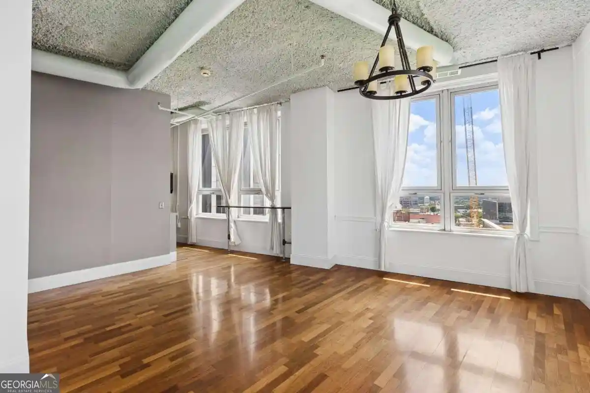 Listing Photo 1 - Condo for sale in 20 Marietta St Nw located at 20 Marietta St Nw, Atlanta, GA 30303 - Unit #15E
