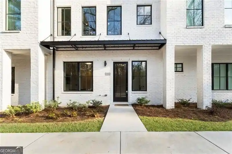 Photo 1 of Townhouse for sale at 2202 Carlton Ct, Atlanta, GA 30318 | MLS# 10856445 | Listing updated on 2026-10-15