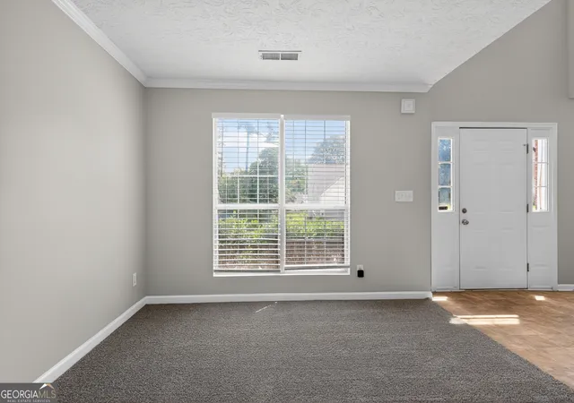 Photo 3 of Sale Pending at 1121 Huntington Pl Cir, Lithonia, GA 30058 | MLS# 10779705 | Listing updated on 2026-10-08