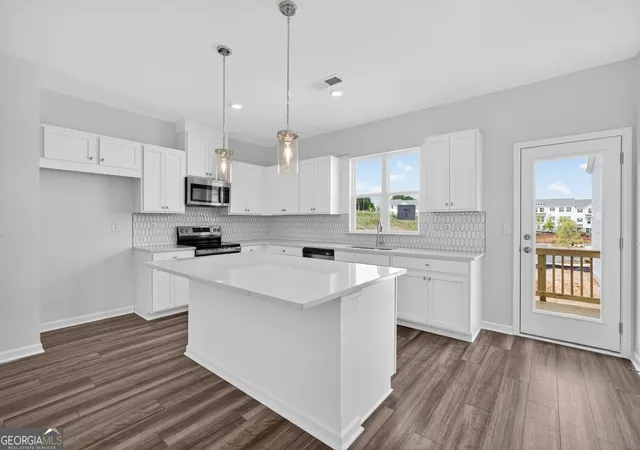 Photo 4 of Townhouse for sale at 104 Epperly Way, Tucker, GA 30084 | MLS# 10708306 | Listing updated on 2026-10-09
