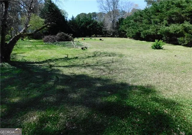 1st image of 5265 Five Forks Trickum Rd Sw, Lilburn, GA 30047 | MLS# 10712551