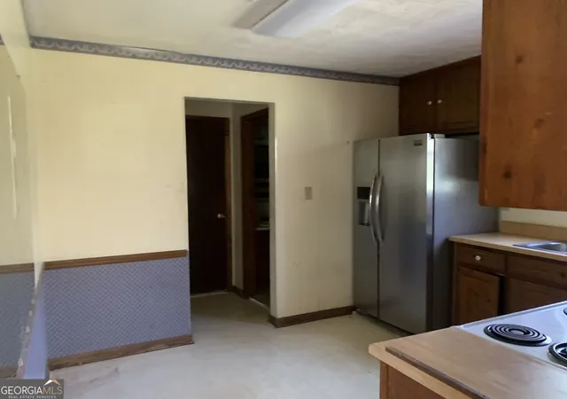 Photo 4 of Sale Pending at 7038 Whitfield Dr, Riverdale, GA 30296 | MLS# 10720020 | Listing updated on 2026-06-01