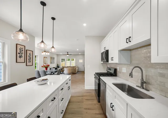 Photo 4 of Townhouse for sale at 411 Oliver St NW, Atlanta, GA 30314 | MLS# 10829602 | Listing updated on 2026-09-03