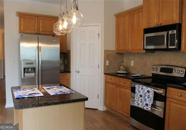 Photo 2 of Townhouse for sale at 2059 Liberty Ct NW, Atlanta, GA 30318 | MLS# 10791412 | Listing updated on 2026-08-21