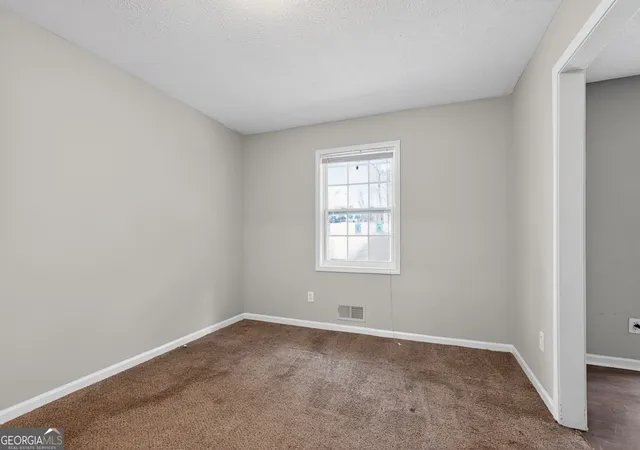 4th image of 6925 Kimberland Gardens Ln, Lithonia, GA 30058 | MLS# 10716471