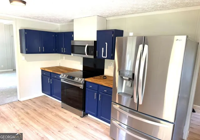 Photo 2 of Manufactured home for sale at 231 Hawks Wy, Chatsworth, GA 30705 | MLS# 10827864 | Listing updated on 2026-09-11
