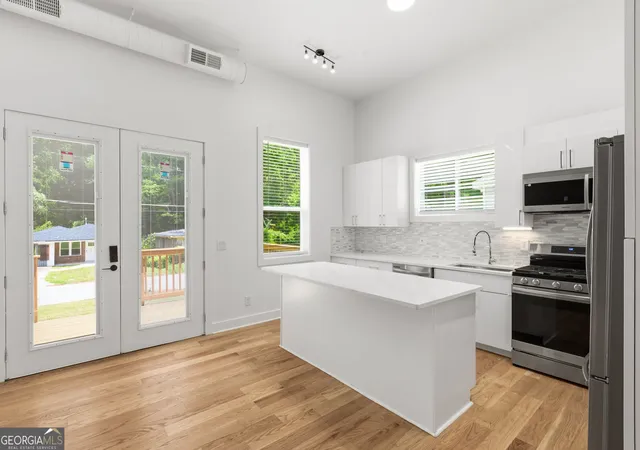 Photo 2 of Single family home for sale at 2585 Hood Ave Nw, Atlanta, GA 30318 | MLS# 10804097 | Listing updated on 2026-09-26