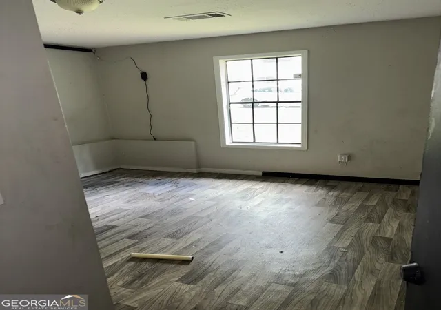 Photo 3 of Single family home for sale at 1036 Mainstreet Lake Dr, Stone Mountain, GA 30088 | MLS# 10808528 | Listing updated on 2026-09-19