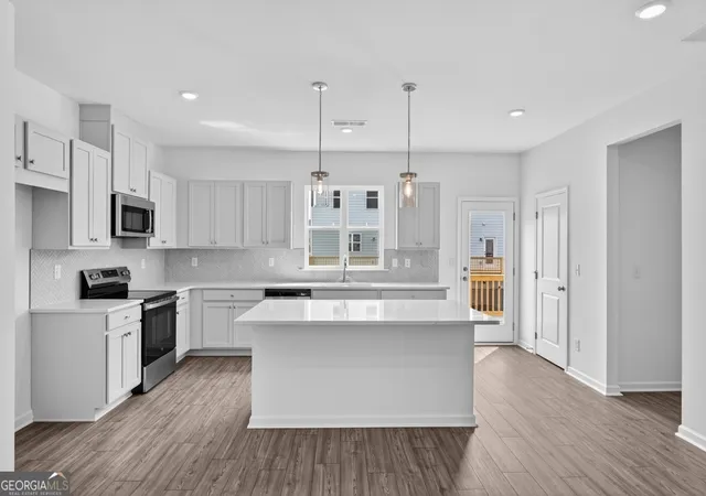 Photo 3 of Townhouse for sale at 102 Epperly Way, Tucker, GA 30084 | MLS# 10768558 | Listing updated on 2026-09-18
