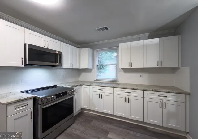 Photo 4 of Single family home for sale at 214 Pinewood Ln, Stockbridge, GA 30281 | MLS# 10764221 | Listing updated on 2026-08-16