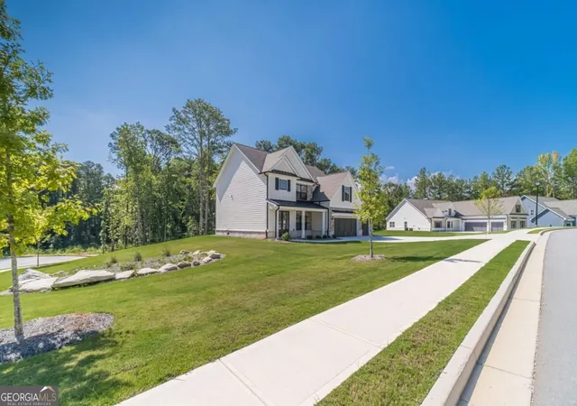 Photo 3 of Single family home for sale at 907 Bessie Ct, Loganville, GA 30052 | MLS# 10829313 | Listing updated on 2026-09-20
