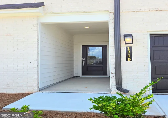 Photo 2 of Townhouse for sale at 1319 Farmers Loop #LOT 4, Austell, GA 30106 | MLS# 10816344 | Listing updated on 2026-09-10