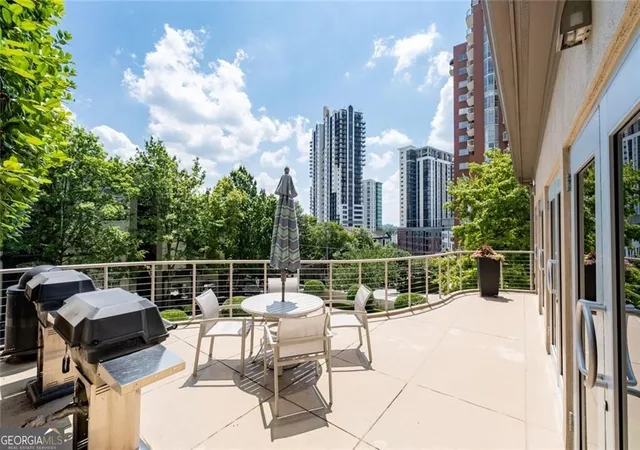 Listing Photo 2 - Condo for sale in building located at 3475 Oak Vly Rd Ne, Atlanta, GA 30326 - Unit #910