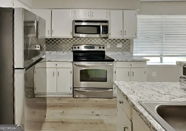 Photo 3 of Townhouse for sale at 8602 Creekwood Way, Jonesboro, GA 30238 | MLS# 10655090 | Listing updated on 2026-09-16