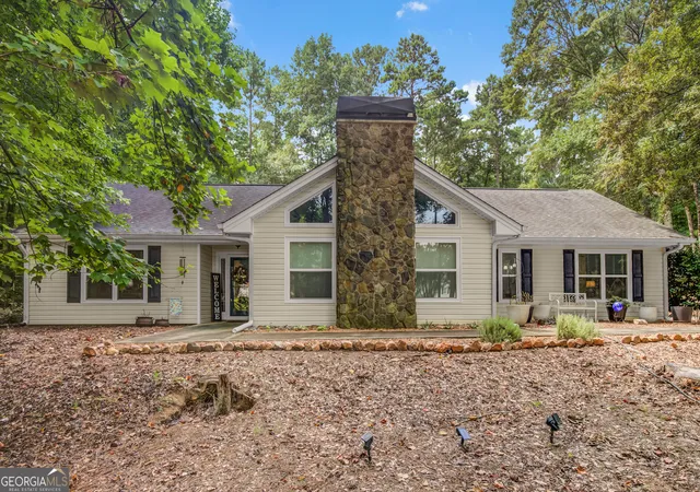 Photo 1 of Single family home for sale at 100 Woodmoor Dr, Newnan, GA 30263 | MLS# 10835321 | Listing updated on 2026-09-11