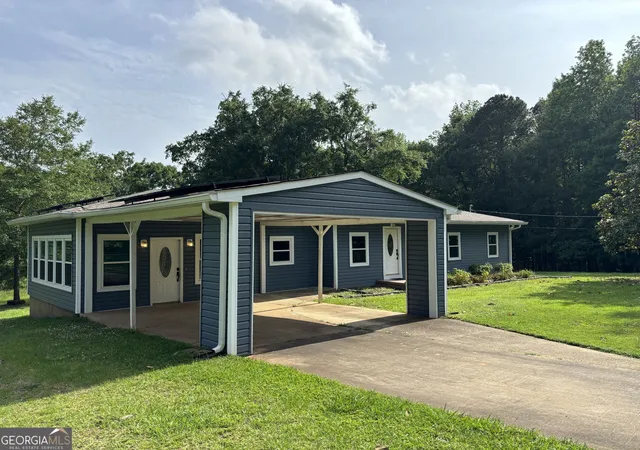 Photo 3 of Single family home for sale at 1402 Dewey St, Griffin, GA 30223 | MLS# 10830044 | Listing updated on 2026-09-21