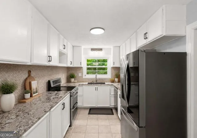 Photo 4 of Condo for sale at 140 Woodhaven Wy, Alpharetta, GA 30009 | MLS# 10826486 | Listing updated on 2026-09-18