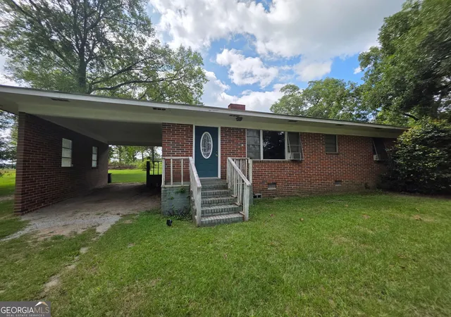 Photo 1 of Single family home for sale at 1056 Tommy Purvis Jr Rd, Reynolds, GA 31076 | MLS# 10823099 | Listing updated on 2026-09-18
