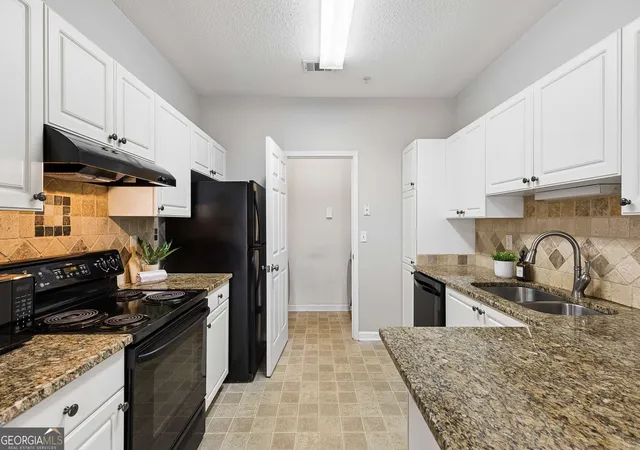 Photo 3 of Condo for sale at 1112 Woodland Ln, Alpharetta, GA 30009 | MLS# 10827272 | Listing updated on 2026-09-17
