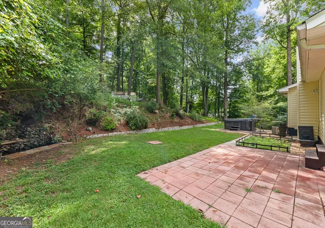 Photo 2 of Single family home for sale at 702 Osco Pkwy, Woodstock, GA 30188 | MLS# 10805850 | Listing updated on 2026-09-15