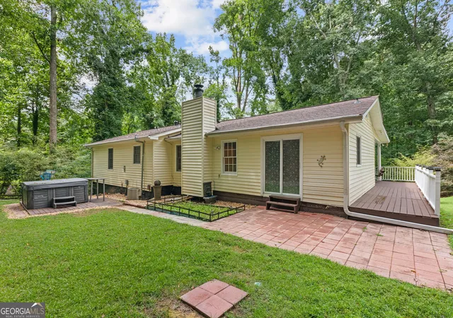 Photo 3 of Single family home for sale at 702 Osco Pkwy, Woodstock, GA 30188 | MLS# 10805850 | Listing updated on 2026-09-15