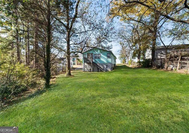 Photo 2 of Single family home for sale at 5211 Oakdale Rd Se, Smyrna, GA 30082 | MLS# 10671250 | Listing updated on 2026-09-03