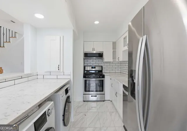 Photo 3 of Townhouse for sale at 6980 Roswell Rd #K4, Atlanta, GA 30328 | MLS# 10822080 | Listing updated on 2026-10-07