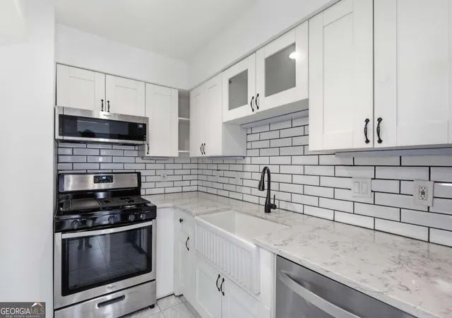 Photo 4 of Townhouse for sale at 6980 Roswell Rd #K4, Atlanta, GA 30328 | MLS# 10822080 | Listing updated on 2026-10-07