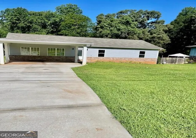 Photo 2 of Single family home for sale at 7241 Grayson Dr, Riverdale, GA 30296 | MLS# 10823206 | Listing updated on 2026-09-12