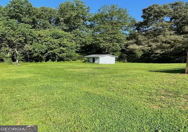 Photo 3 of Single family home for sale at 7241 Grayson Dr, Riverdale, GA 30296 | MLS# 10823206 | Listing updated on 2026-09-15