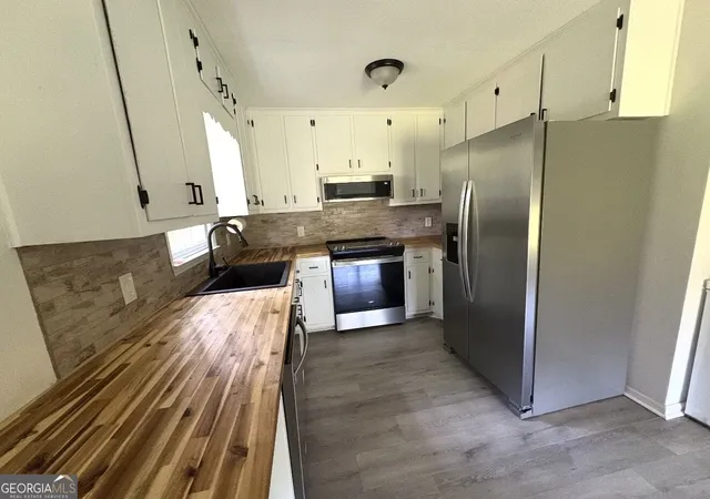 Photo 3 of Single family home for sale at 1468 Hwy 41 N, Milner, GA 30257 | MLS# 10830506 | Listing updated on 2026-09-04