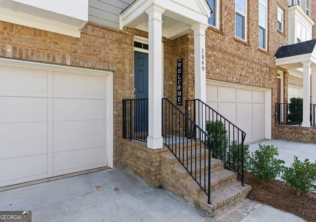 Photo 2 of Townhouse for sale at 1049 Caruso Dr, Buford, GA 30518 | MLS# 10785991 | Listing updated on 2026-09-13