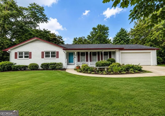 1st image of 4875 Five Forks Trickum Rd Sw, Lilburn, GA 30047 | MLS# 10814539